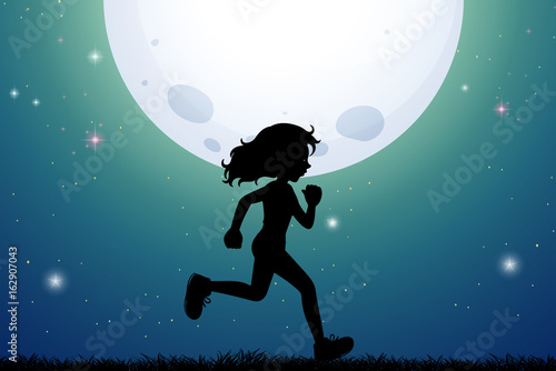Silhouette of girl jogging in park