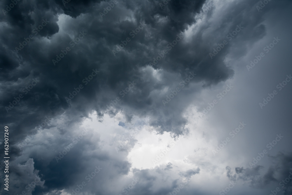 clouds with background,sunlight through very dark clouds background of dark storm clouds,black sky Background of dark clouds before a thunder. clouds with background,sunlight through very dark clouds background of dark storm clouds,black sky Background of dark clouds before a thunder.