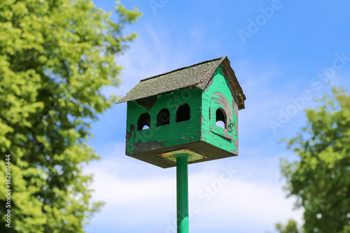 Wooden birdhouse for birds in nature