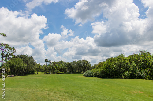 Fototapeta Naklejka Na Ścianę i Meble -  Golf Course under Beautiful Sky
