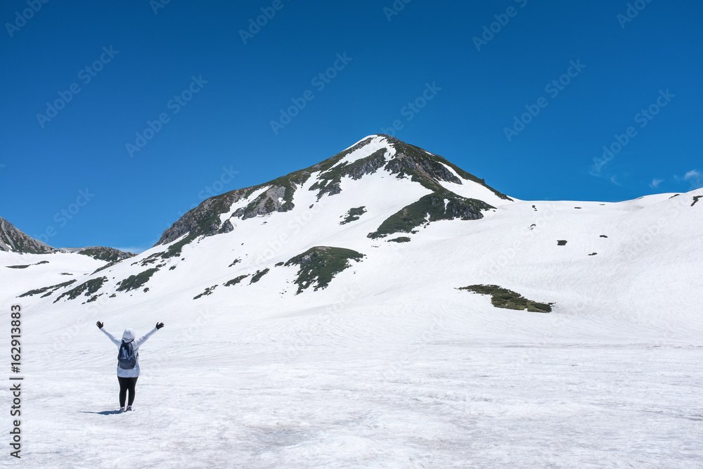 woman on snow mountain