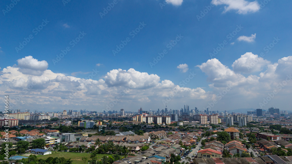 Blue sky with clouds in downtown Kuala Lumpur, Malaysia