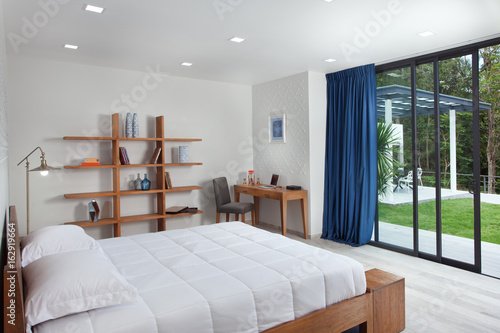 Panoramic view of nice white stylish modern bedroom