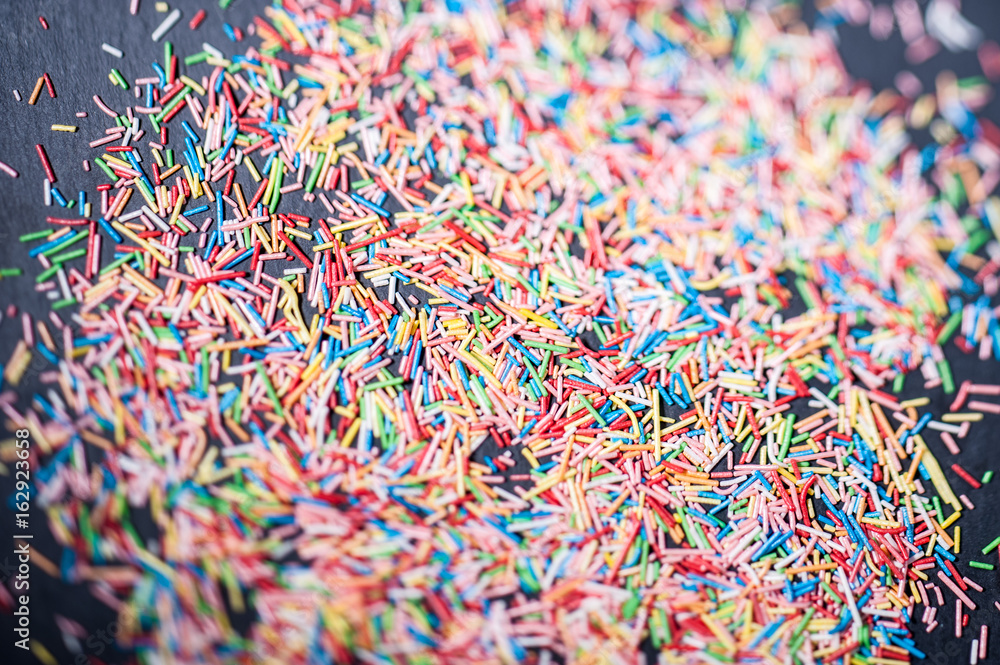messy sprinkles on a table messy sprinkles on a table