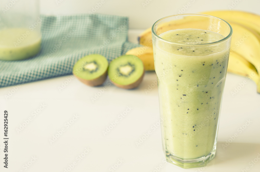 Banana smoothie with kiwi. Healthy food concept Banana smoothie with kiwi. Healthy food concept