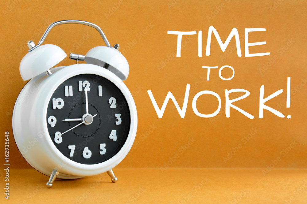 TIME to WORK text on retro brown background with alarm clock showing 9 o'clock TIME to WORK text on retro brown background with alarm clock showing 9 o'clock
