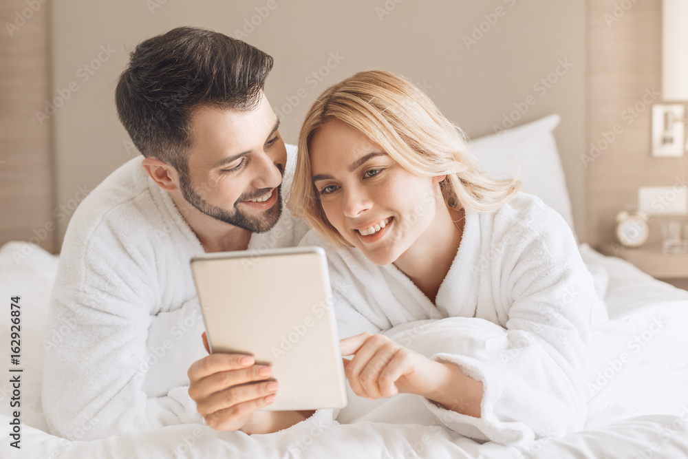 Young couple travel together hotel room leisure Young couple travel together hotel room leisure