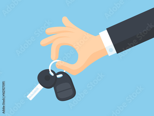 Hand holding car keys vector illustration in flat style