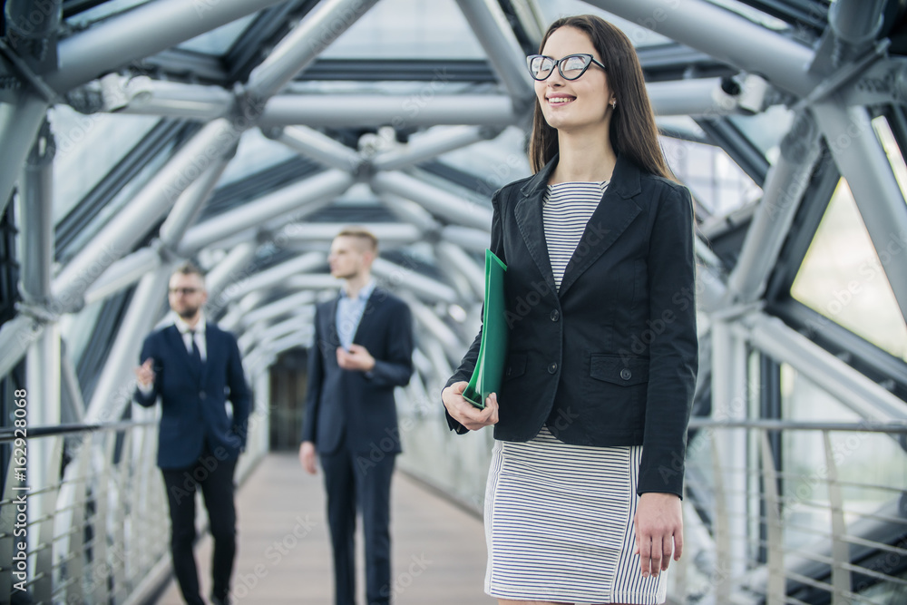 Portrait of a smiling businesswoman in business center Portrait of a smiling businesswoman in business center