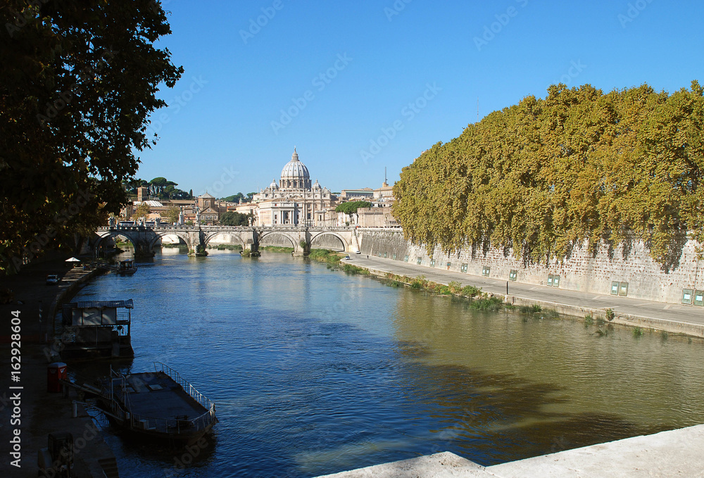 Bridge, basilica and the river Tiber in Rome