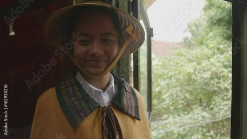 Portrait of a sweet smiling girl in non la photo