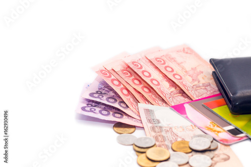 Thai banknotes and calculator on white background