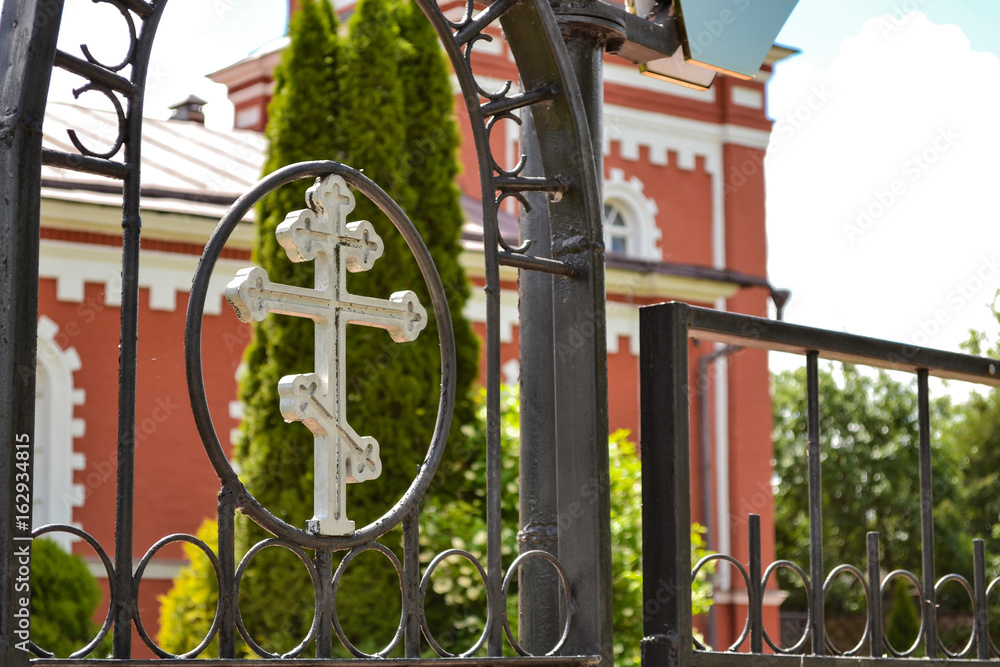 Fence with a cross around the Orthodox Church Fence with a cross around the Orthodox Church