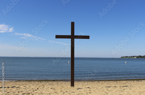 religious cross on a beach