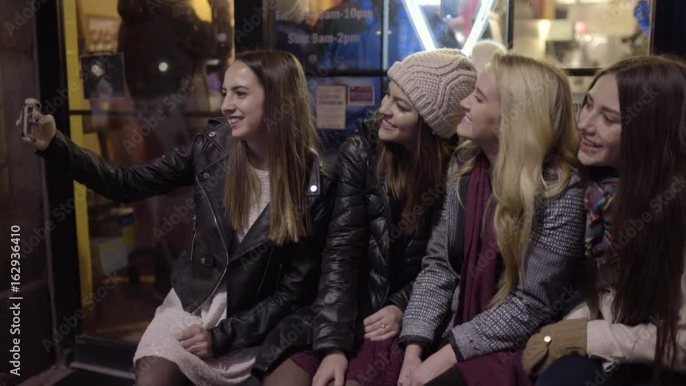 Friends Pose Together For Girls Night Out Selfies, Outside Of Downtown Cafe Friends Pose Together For Girls Night Out Selfies, Outside Of Downtown Cafe