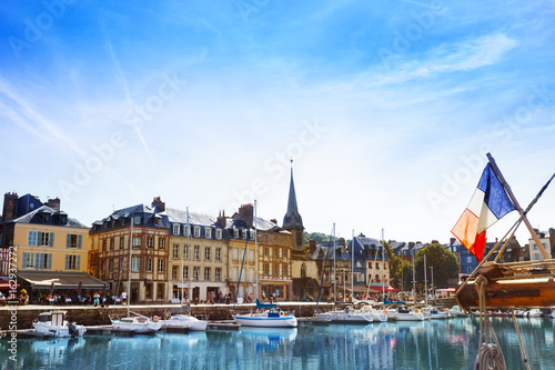 Photography Honfleur harbor with sailboats at sunny day