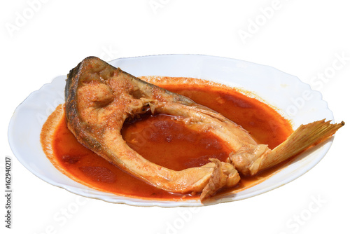 Plate fish soup with a piece of fish