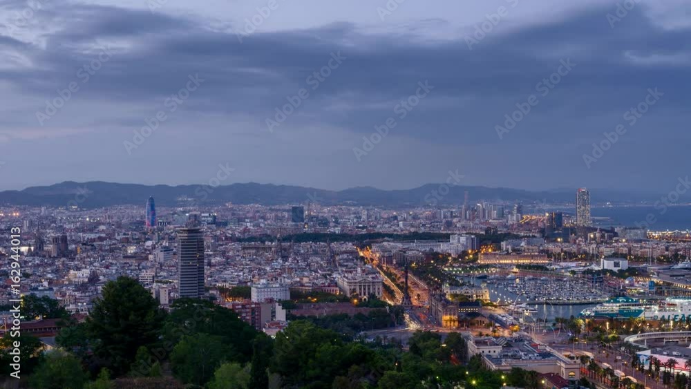 Time-lapse of evening in Barcelona city and port, Spain Time-lapse of evening in Barcelona city and port, Spain
