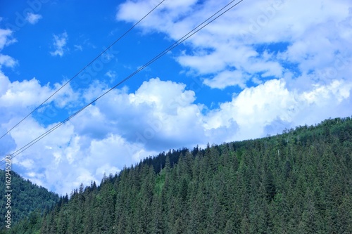 Panorama of Carpathians Mountains against the background of the sky and clouds