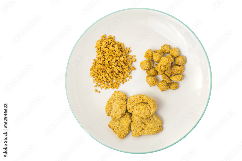 Vegetarian food dry soy products meat on plate. Vegetarian food dry soy products meat on plate.