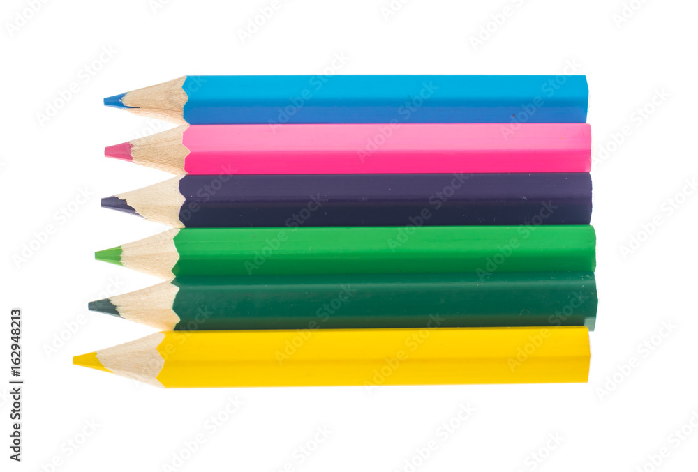 Line of colored pencils on white background Line of colored pencils on white background
