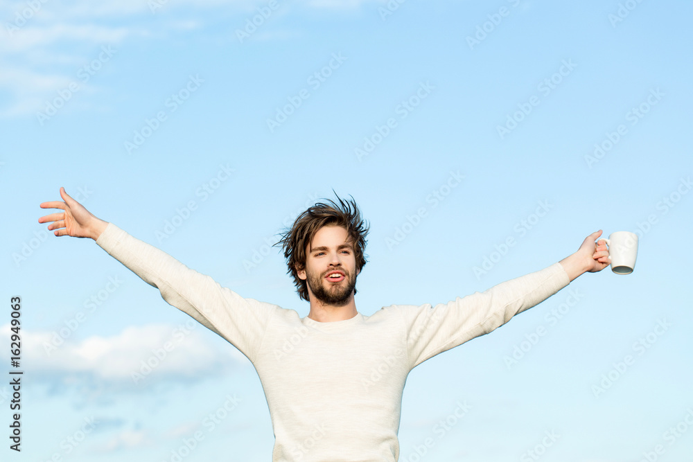energy and freedom, happy man with cup of coffee energy and freedom, happy man with cup of coffee