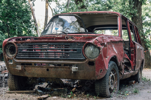 Old broken abandoned rusty retro car © DedMityay