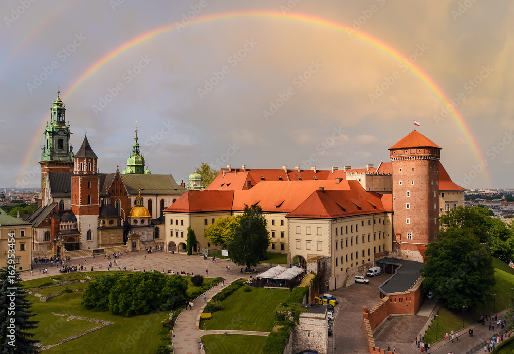 Naklejka premium Krakow - Wawel castle in the evening and rainbow in the sky.