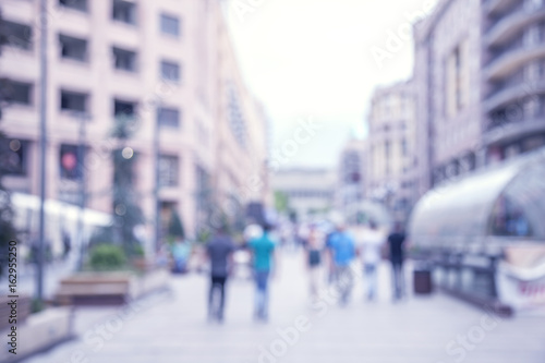 Abstract blurred image of a city street scene.