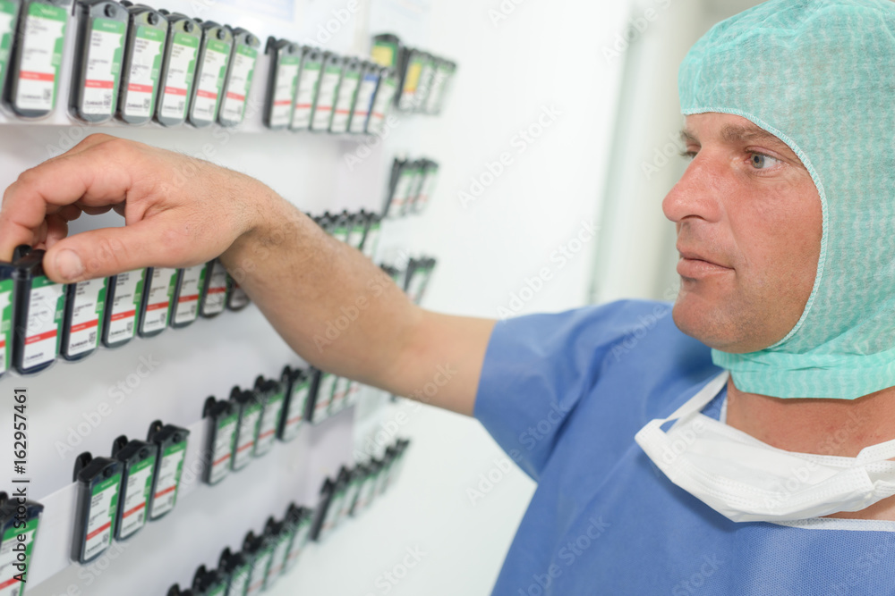 laboratory technician choosing samples labeled laboratory technician choosing samples labeled