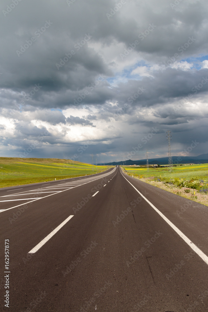 Highway. Open views and sunny weather to travel. Highway. Open views and sunny weather to travel.