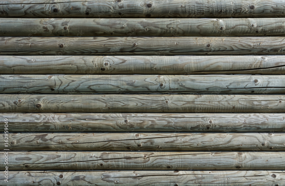 Empty wooden texture from big roundwoods. Protective barrier around motorway. Empty wooden texture from big roundwoods. Protective barrier around motorway.