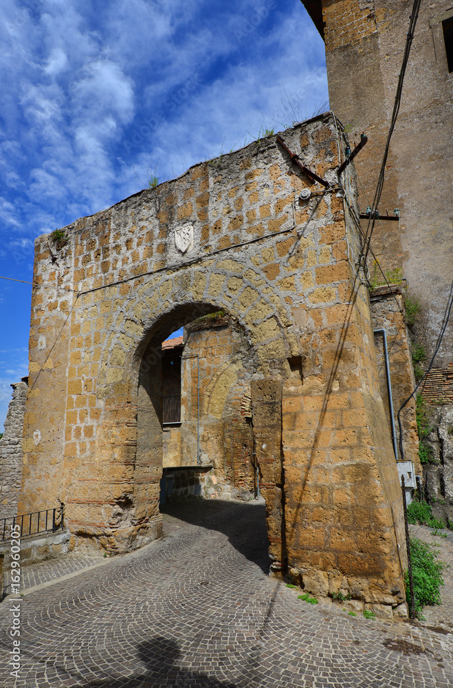 Ancient medieval gate in the ruined city of Faleria, near Rome