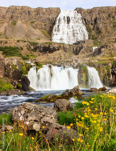 The beautiful summer view of Dynjandifoss (Dynjandi Waterfall), jewels of the Westfjords, Iceland. The biggest waterfall in Westfjords. photo