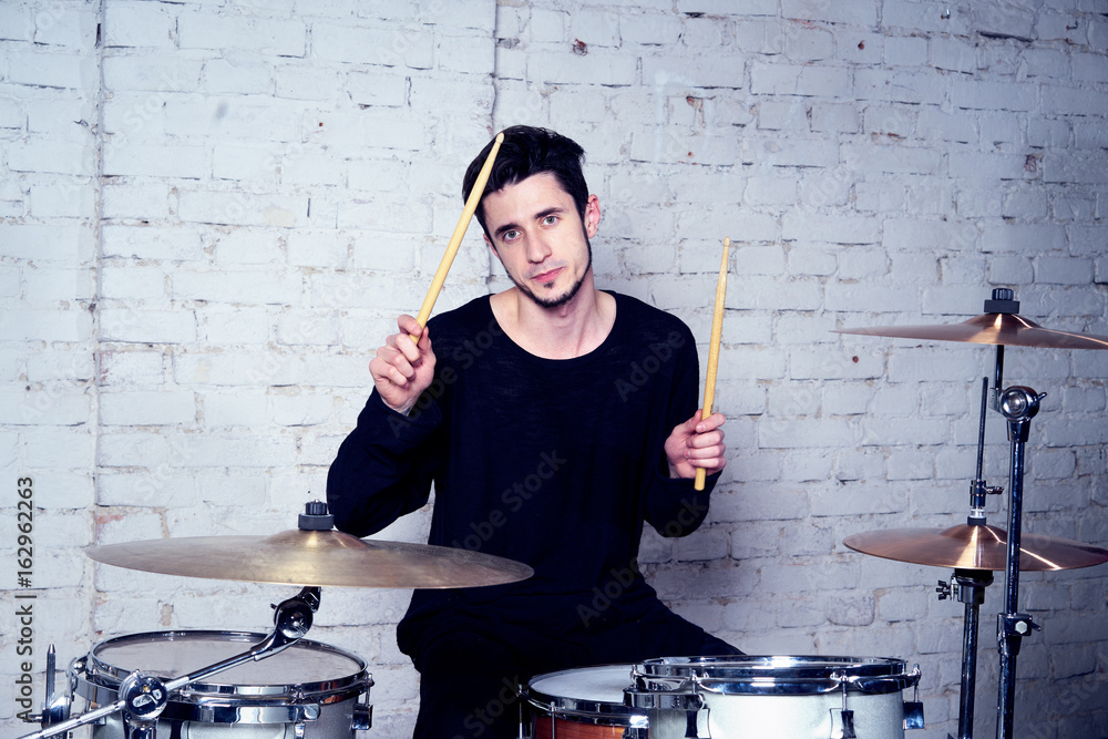 Fototapeta premium the drummer behind the drums