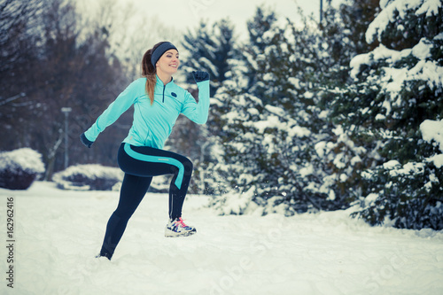 Winter sport, girl exercising in park