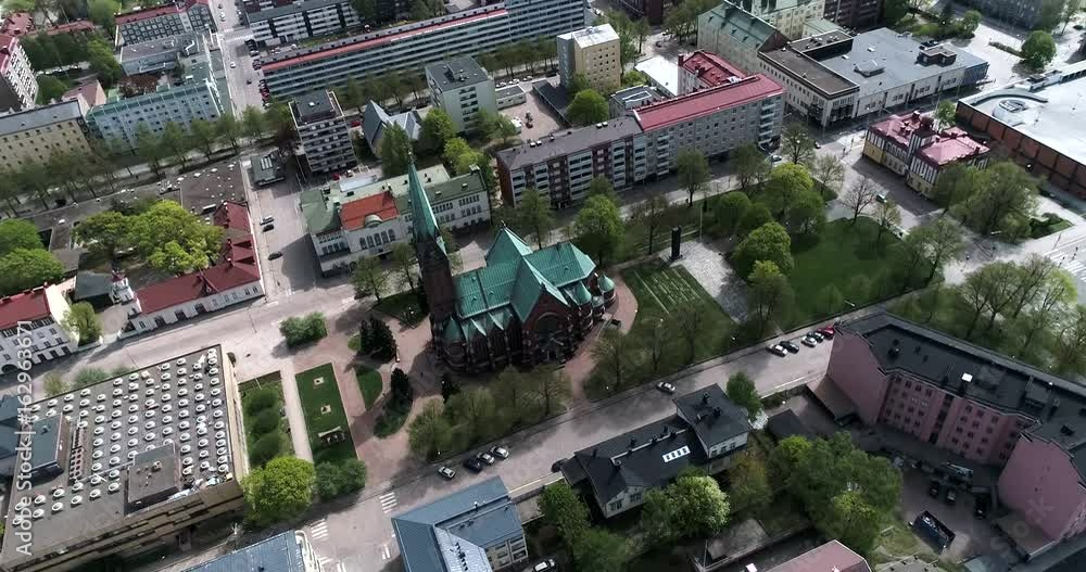 Kotka church, Cinema 4k aerial around Kotkan kirkko revealing the cityscape, in Kymenlaakso, Finland Kotka church, Cinema 4k aerial around Kotkan kirkko revealing the cityscape, in Kymenlaakso, Finland