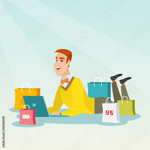 Young caucasian man doing online shopping.