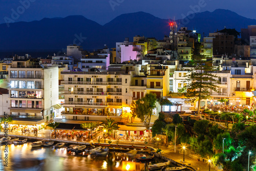 Agios Nikolaos, one of the most touristic cities on Crete island, at summer evening, Greece.