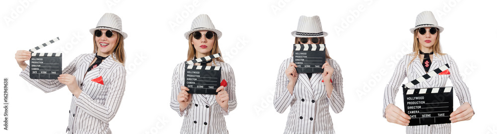Beautiful girl in striped clothing holding clapperboard isolated Beautiful girl in striped clothing holding clapperboard isolated