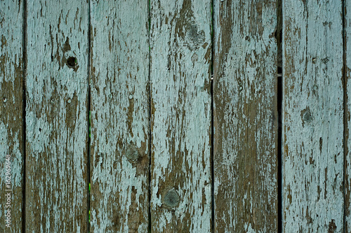 Old painted ragged wooden wall background