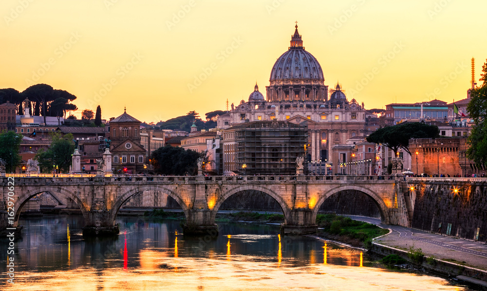 Skyline with bridge Ponte Vittorio Emanuele II and classic architecture in Rome, Vatican City scenery over Tiber river.