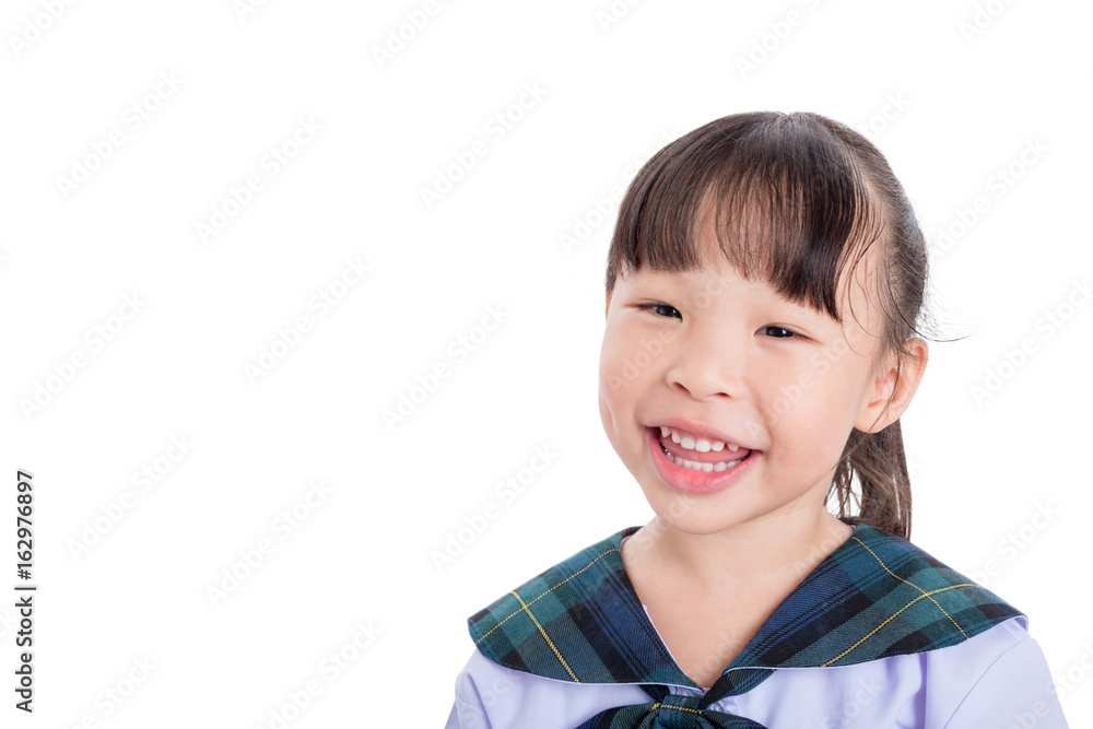 Little asian schoolgirl smiling over white background Little asian schoolgirl smiling over white background