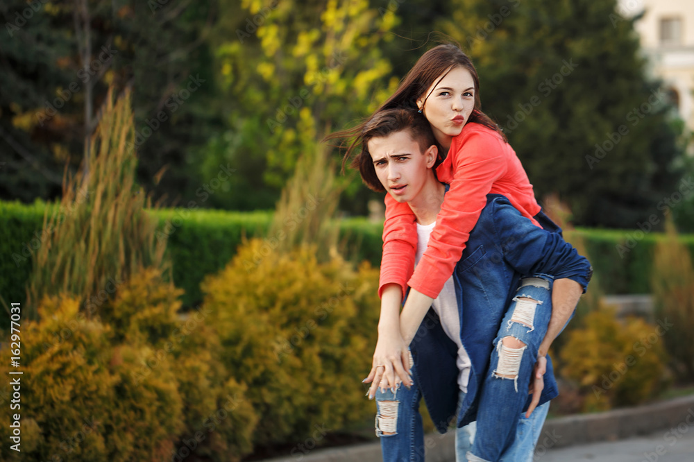 Guy rolls his girlfriend Piggyback Guy rolls his girlfriend Piggyback