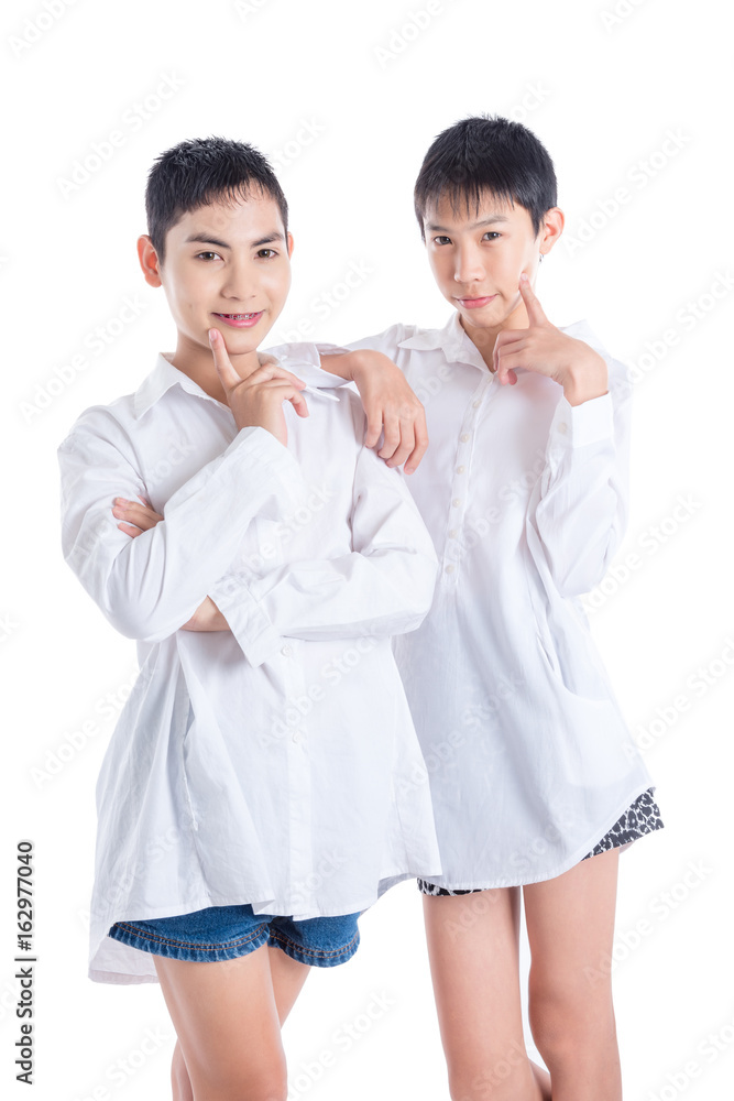 Young asian boy standing over white background Young asian boy standing over white background
