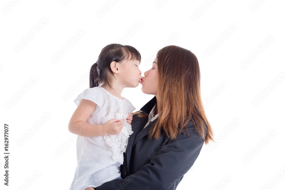 Asian mother and her daughter kissing over white background Asian mother and her daughter kissing over white background