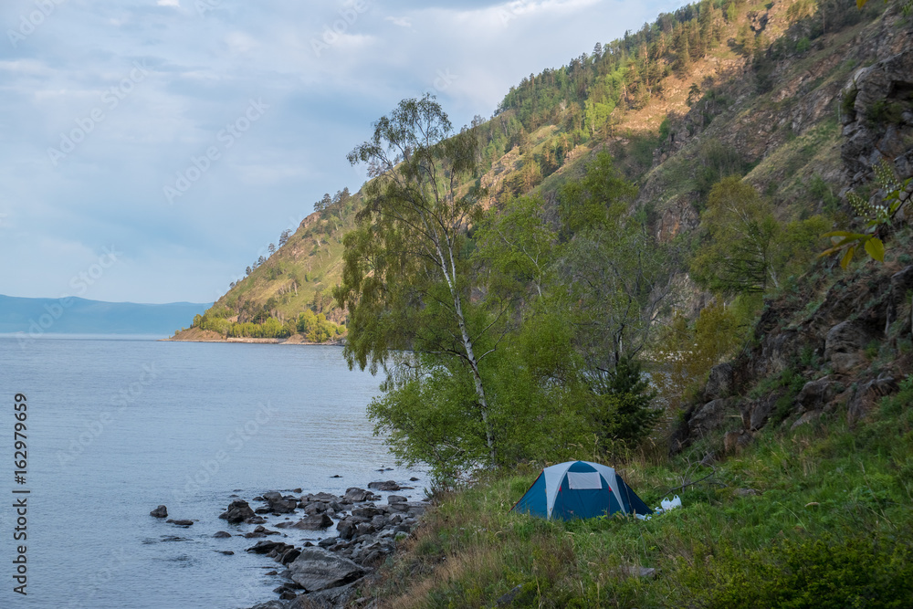Tourist tent on the shore of Lake Baikal