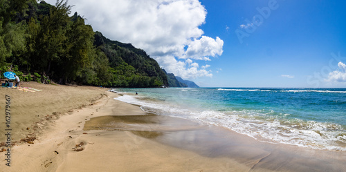 Panorama Ke'e Beach, with lone beach umbrella, Kauai, Hawaii photo