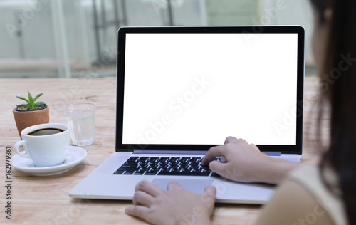 Businessman at work using a desktop computer of the blank screen