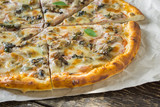 Pizza on rustic background